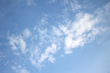 Naklejka na ściany i meble Blue sky and clouds with soft focus.