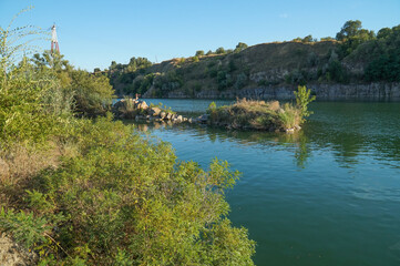 A beautiful flooded granite quarry near the Dnieper river. The village of  Staryye kodaki.