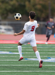 Athletic boy making amazing plays during a soccer game