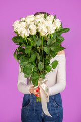 The girl with big bouquet of whites roses