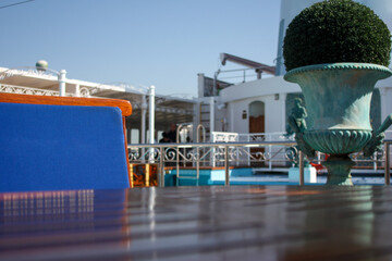 Pooldeck or swimmingpool with outdoor sun deck on luxury classic cruiseship or cruise ship liner...