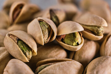 macro of open pistachio nuts. Selective focus