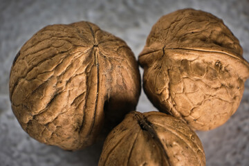 Obraz premium Walnut close up macro on black background.