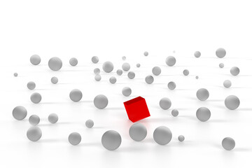 A unique red cube on the background of the same white beaten balls.