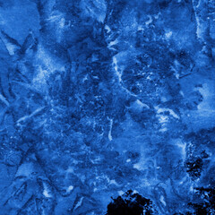 Blue ink and watercolor frost texture on white paper background. Paint leaks and decalcomania effects. Hand-painted gouache abstract image. Mess on the canvas.