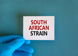 New covid south african strain symbol. Hand in blue glove with white card. Concept words 'south...