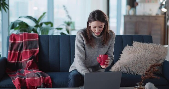 Young Caucasian Woman Stayoing Home Leading Online Lecture Meeting of International Students Teaching English Language Communicating from Home.