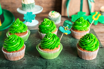 Tasty cupcakes for St. Patrick's Day on table