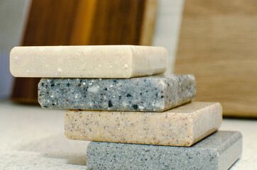 Samples of acrylic stone for countertops, close-up.