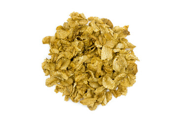 Spelled flakes isolated on white background top view