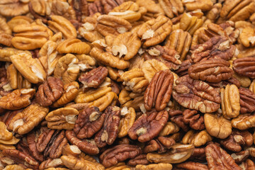 Tasty pecan-nut background. Top view.
