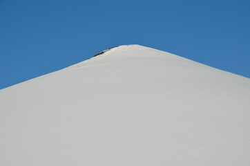 The magical beauty of Svalbard. Unusually blue snow against the clear sky.