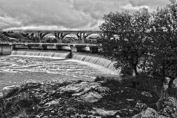 Fuentes claras' dam, at the end of the winter, full of water flooding