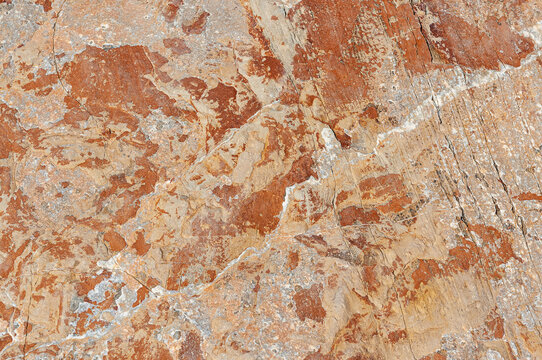 Rustic structural stone. Natural stone background. High resolution brown natural stone surface.