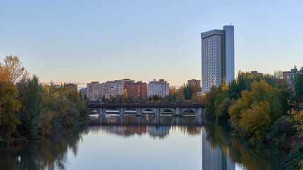 Fototapeta na wymiar Cityscape of Valladolid with the Puente Mayor bridge upon the Pisuerga river.