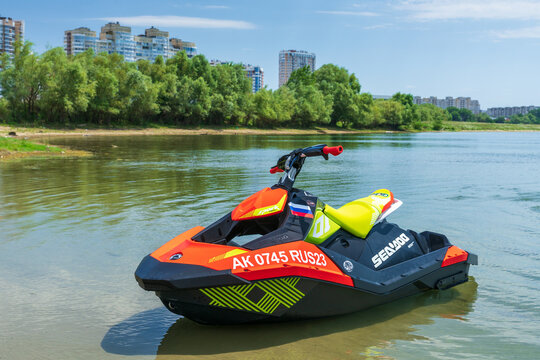 Krasnodar, Russia - July 25, 2020: BRP Sea-Doo jet ski watercraft on still water by river bank