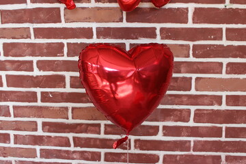 Valentine's Day with red and pink balloons on a red background. Festive party. valentine's day celebration