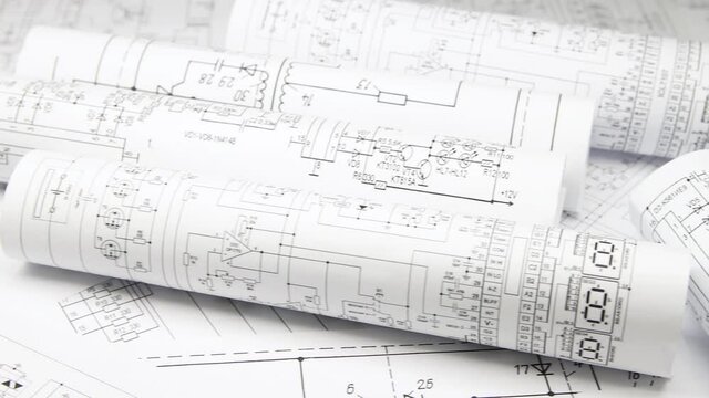 Paper electrical engineering drawings. Work of an electronic engineer.