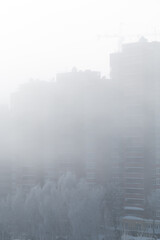 fog over the city, winter cold temperature weather