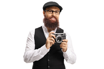 Bearded man hipster with a vintage camera