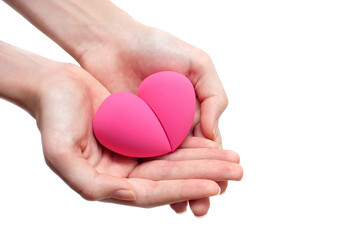 Two pink makeup sponges in hands on a white background