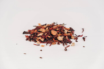 Dry fruit tea scattered on a white table background. Copy, empty space for text