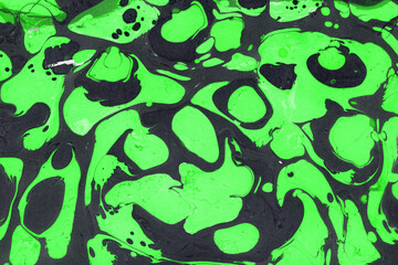 Colorful marble ink texture on watercolor paper background. Marble stone image. Bath bomb effect. Psychedelic biomorphic art.