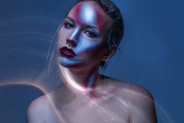 a mystical futuristic portrait of a girl with an experimental neon light. light abstract lines,...