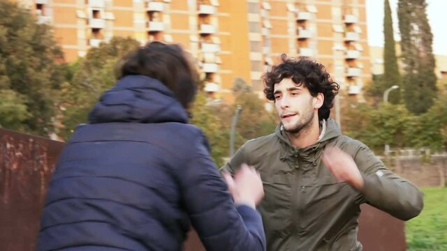 anger, resentment - man in the park is waiting for his friend and attacks him