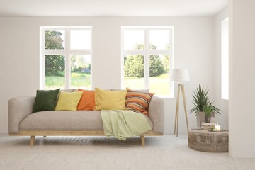 White living room with sofa and summer landscape in window. Scandinavian interior design. 3D illustration