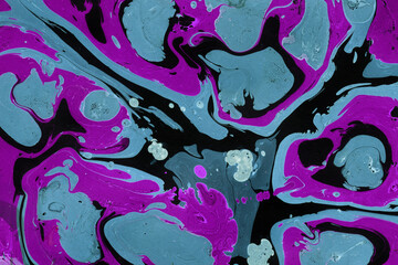 Colorful marble ink texture on watercolor paper background. Marble stone image. Bath bomb effect. Psychedelic biomorphic art.
