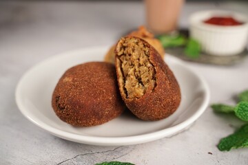 Homemade  Beef Cutlets - Kerala snacks served with tea, selective focus
