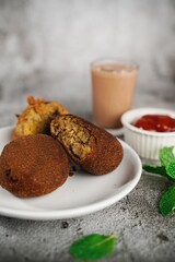 Homemade  Beef Cutlets - Kerala snacks served with tea, selective focus