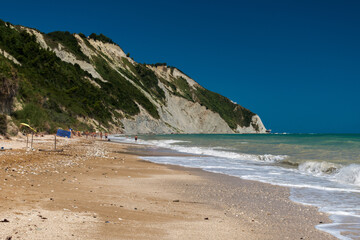 Fototapeta na wymiar The Mezzavalle beach in the Conero area near Ancona during the summer