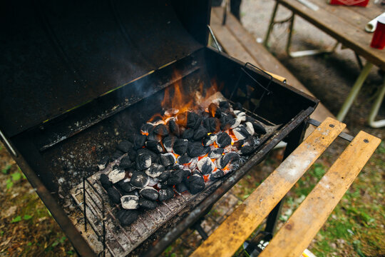 Briquettes Glowing With Heat In BBQ Grill