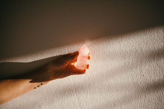 Woman's hands holding crystals