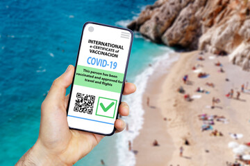 Coronavirus vaccination certificate or vaccine passport for travellers concept. COVID-19 immunity e-passport in the smartphone mobile app for international travelling. 