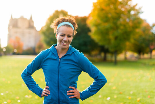 Smiling Athletic Young Woman In Ottawa Park Near Parliament Hill