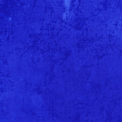 Cardboard blue abstract pattern texture close-up. Retro old paper background. Grunge concrete wall. Vintage blank wallpaper.