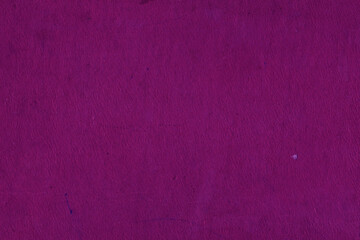 Cardboard purple abstract pattern texture close-up. Retro old paper background. Grunge concrete wall. Vintage blank wallpaper.