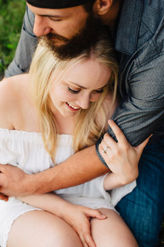 Cute married couple embrace.