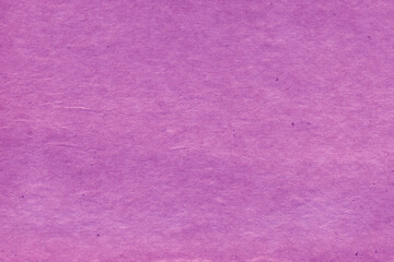 Cardboard purple abstract pattern texture close-up. Retro old paper background. Grunge concrete wall. Vintage blank wallpaper.
