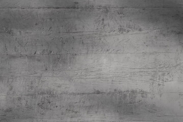 Obraz premium gray background. in the photo, a gray wooden wall of an old building, close-up
