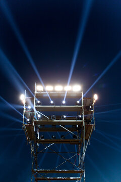 Concert spot lighting over dark background