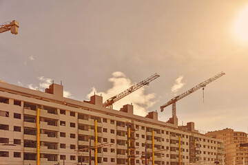 Fototapeta na wymiar Valencia, Spain: 01.26.2021; The crane on the construction site