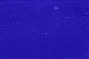 Cardboard blue abstract pattern texture close-up. Retro old paper background. Grunge concrete wall. Vintage blank wallpaper.