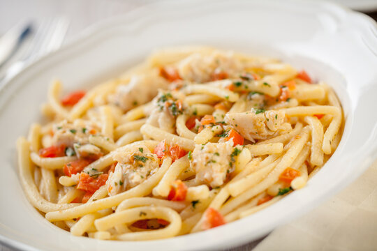 Pasta with fresh tomatoes and cod