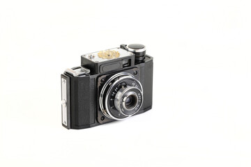 Fototapeta premium Old 35mm bakelite scaling film camera on white background.