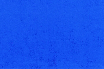 Cardboard blue abstract pattern texture close-up. Retro old paper background. Grunge concrete wall. Vintage blank wallpaper.