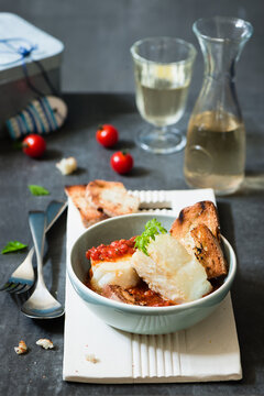 Fried codfish with tomato sauce